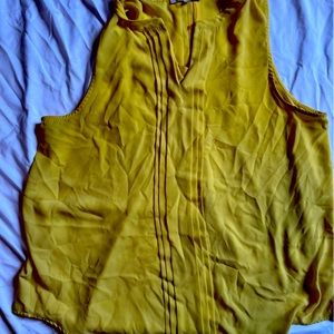 Bright yellow sleeveless blouse